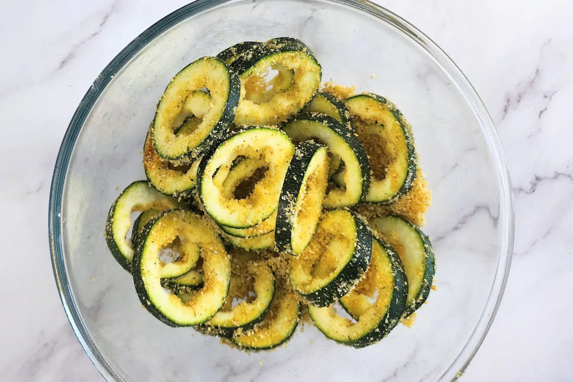 Zucchini rings in mixing bowl