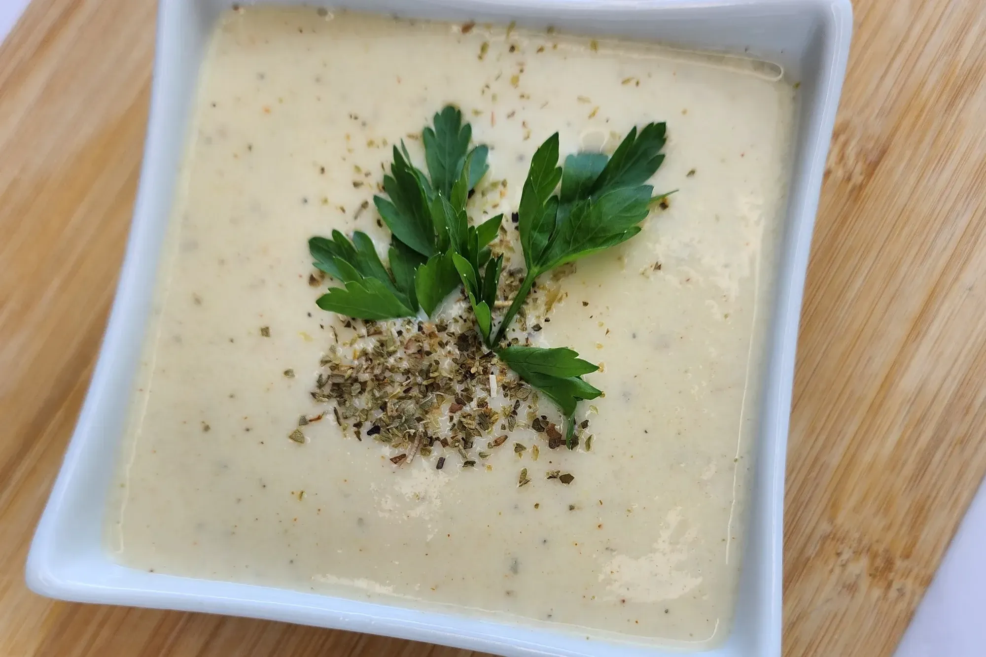 A bowl of dipping sauce.