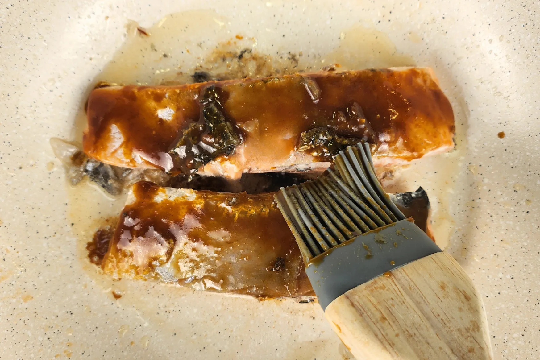 A brush of miso sauce for salmon fillets