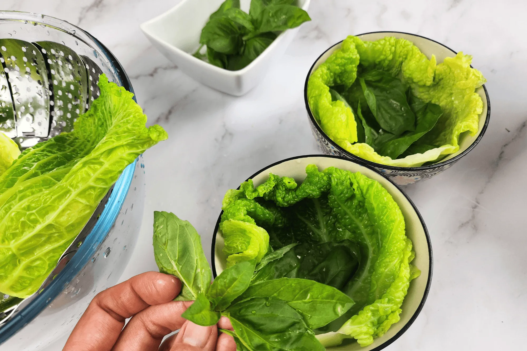 Add a layer of holy basil leaves as a base