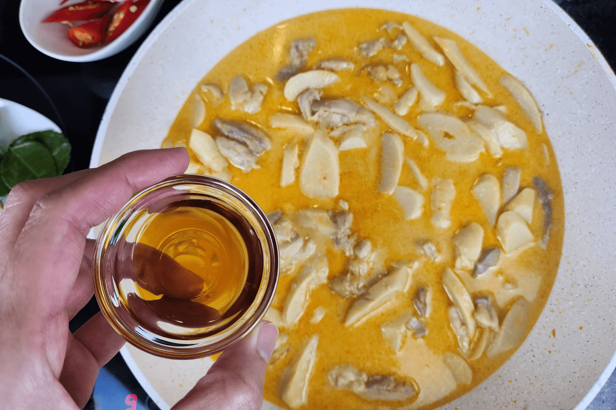 Add fish sauce - bamboo shoots curry