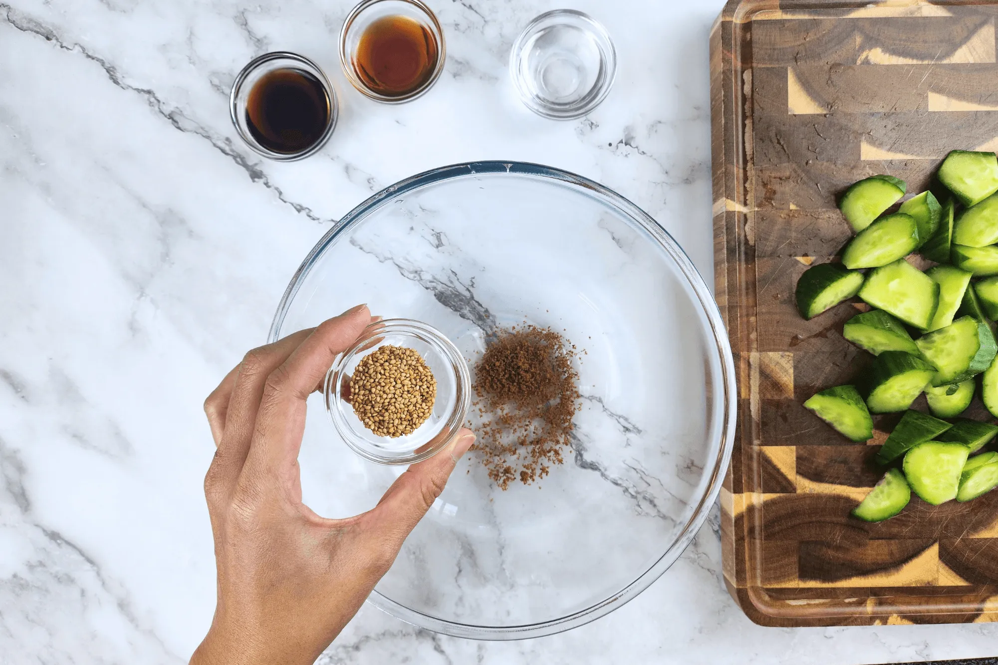 Add roasted sesame seeds into the bowl