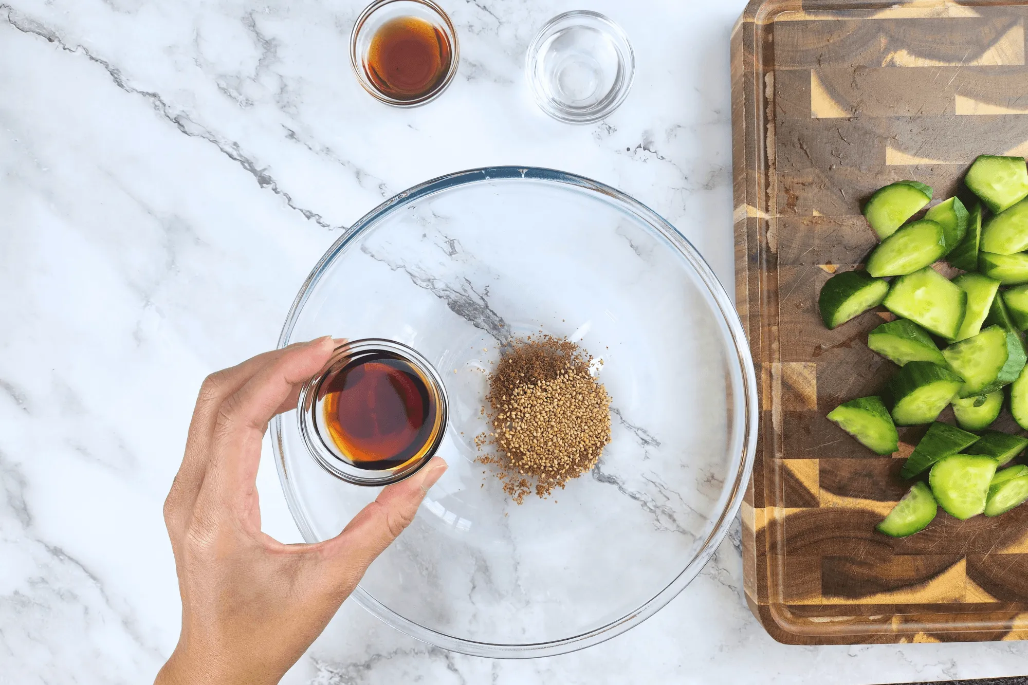 Add sesame oil  into the bowl