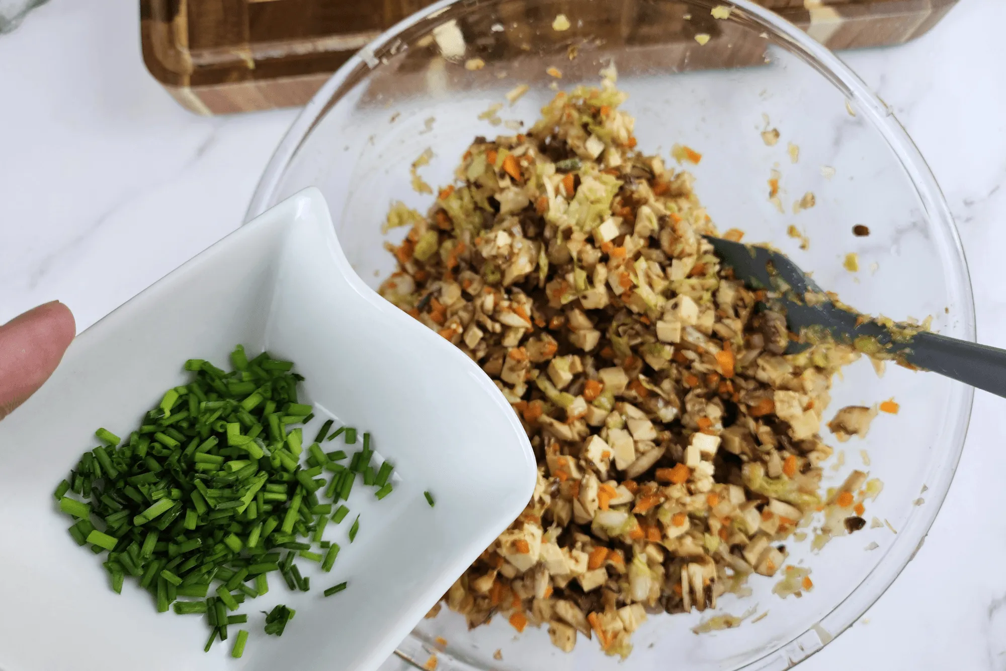 Add spring onion-gyoza filling