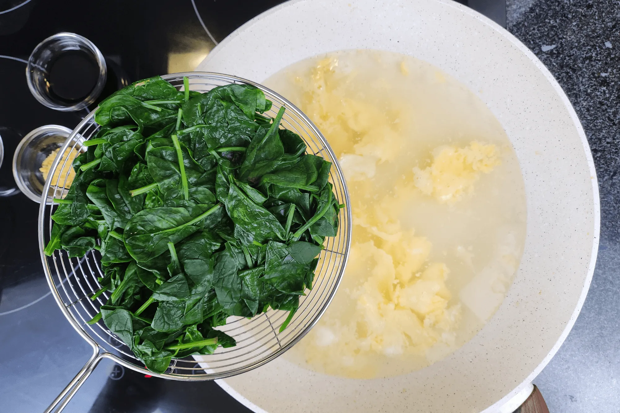 Add the blanched spinach