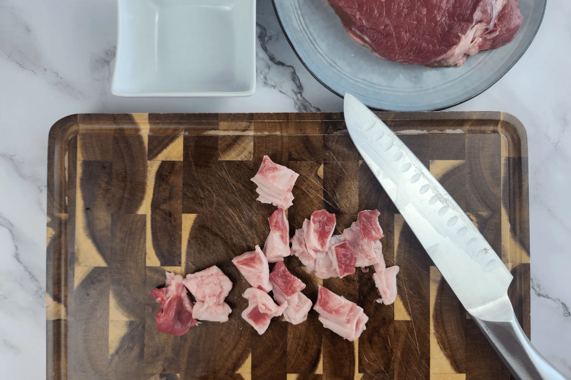 chop beef fat into small pieces.