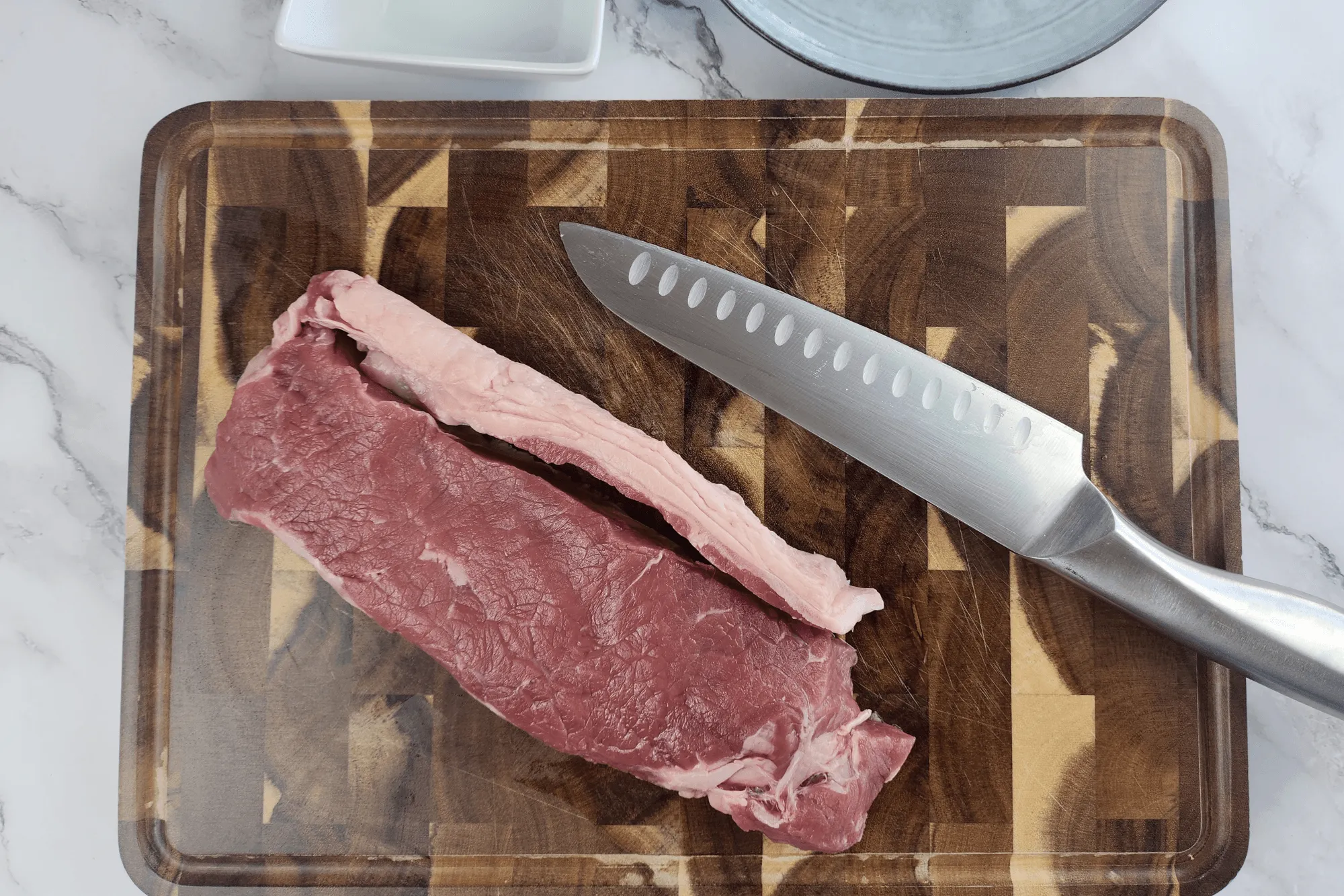 Cut the beef fat away from the meat