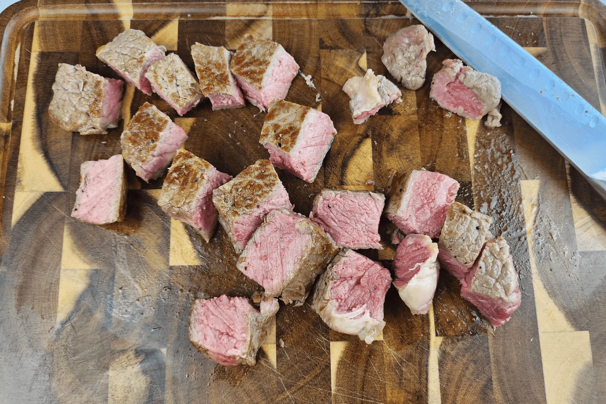 Cut the grilled beef into bite-sized pieces