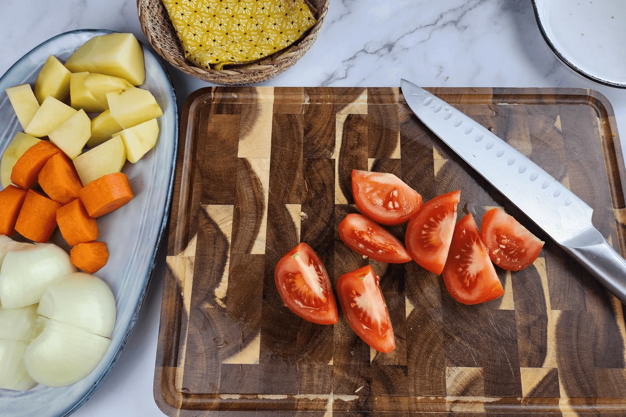 Cut the tomato into wedges or large pieces.