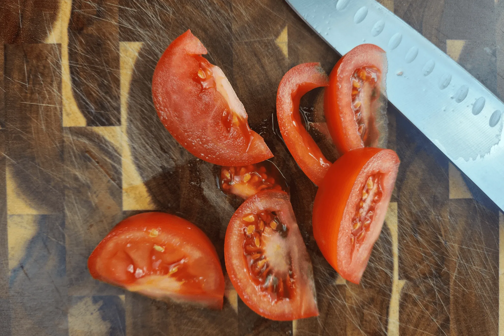 cut the tomatoes into wedges