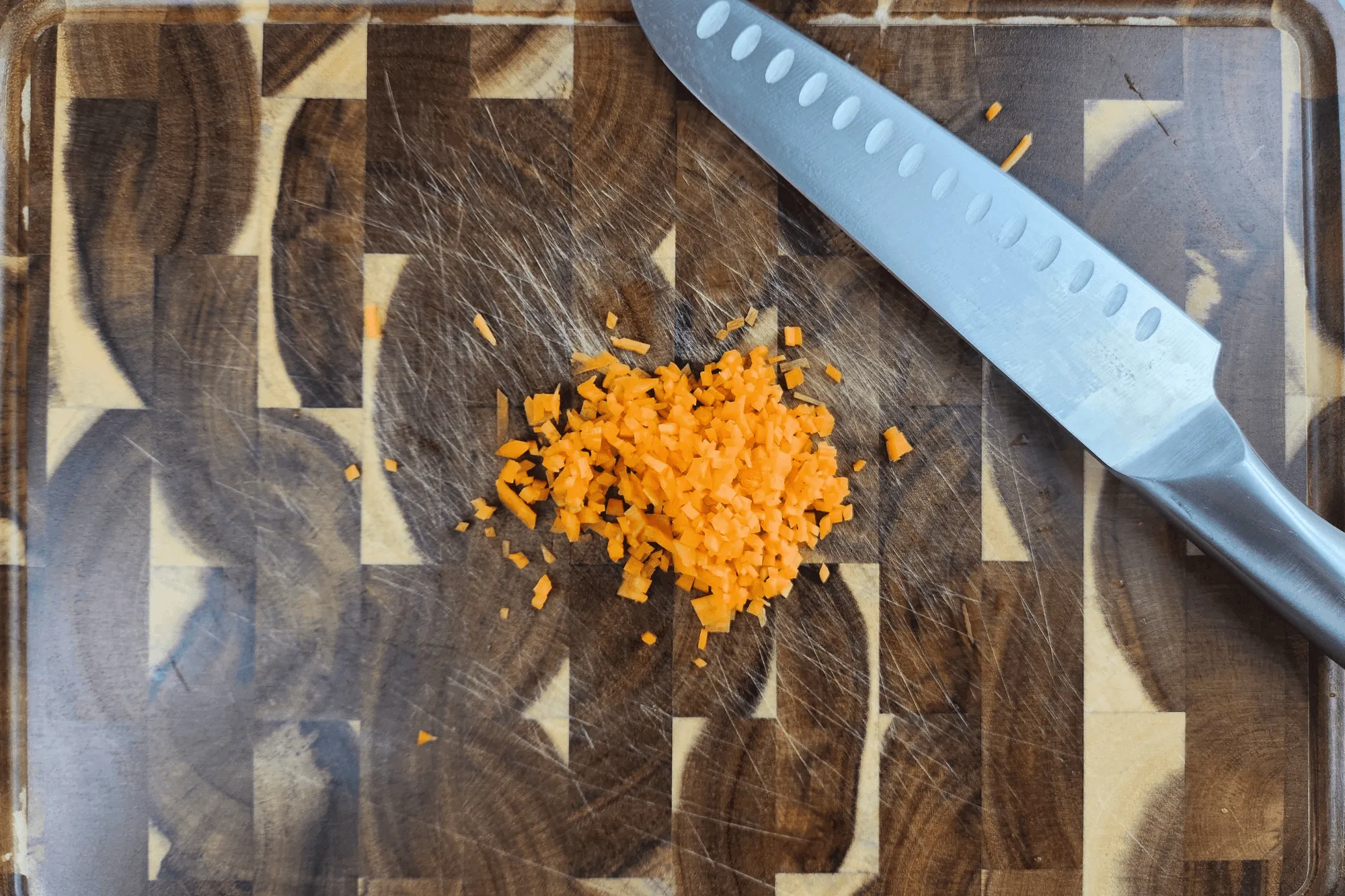 Finely chop the carrot into small pieces.