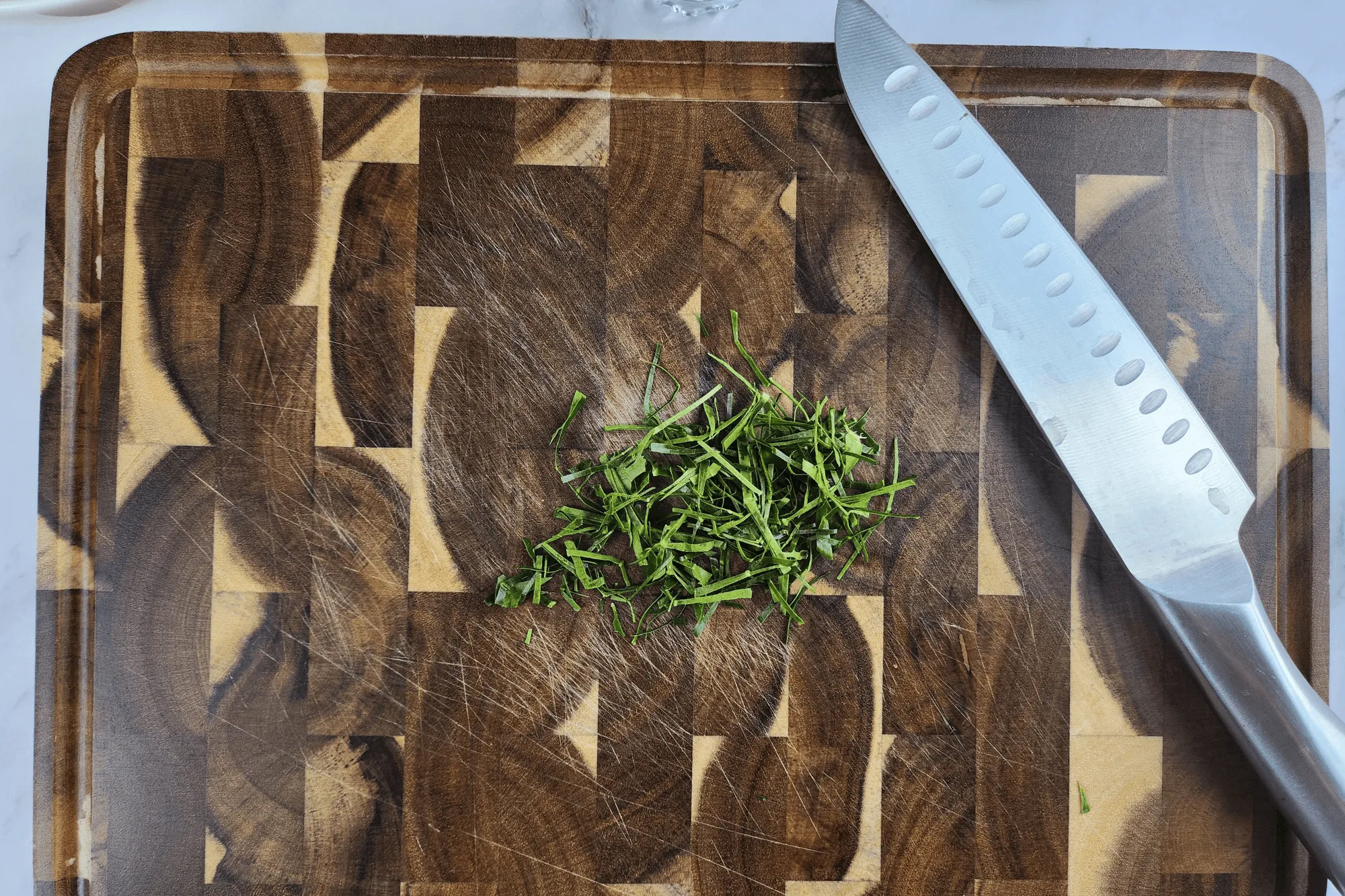 Finely slice the kaffir lime leaves 