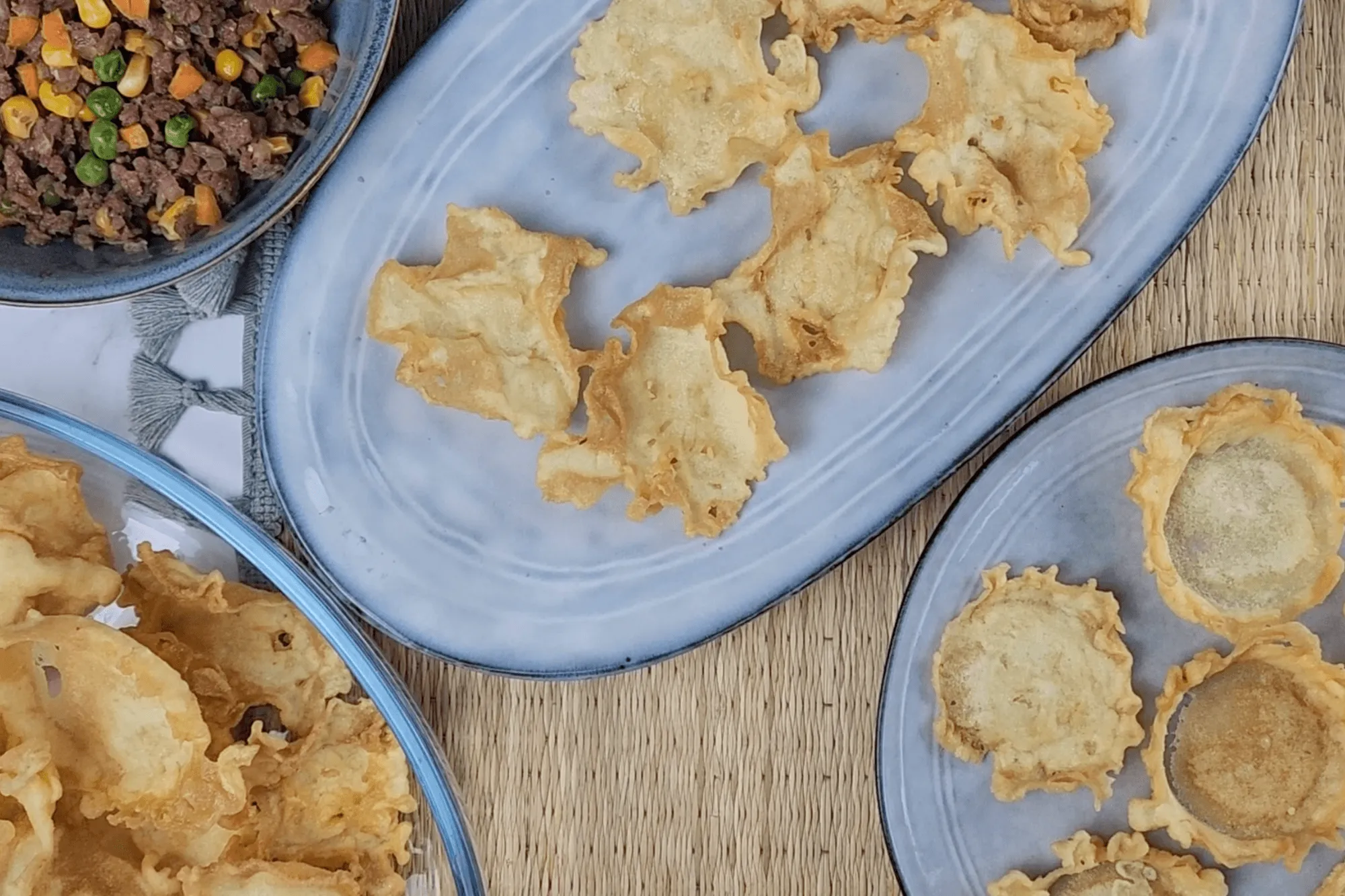 Fry the tartlet shells in the oil until they turn golden and evenly cooked. 