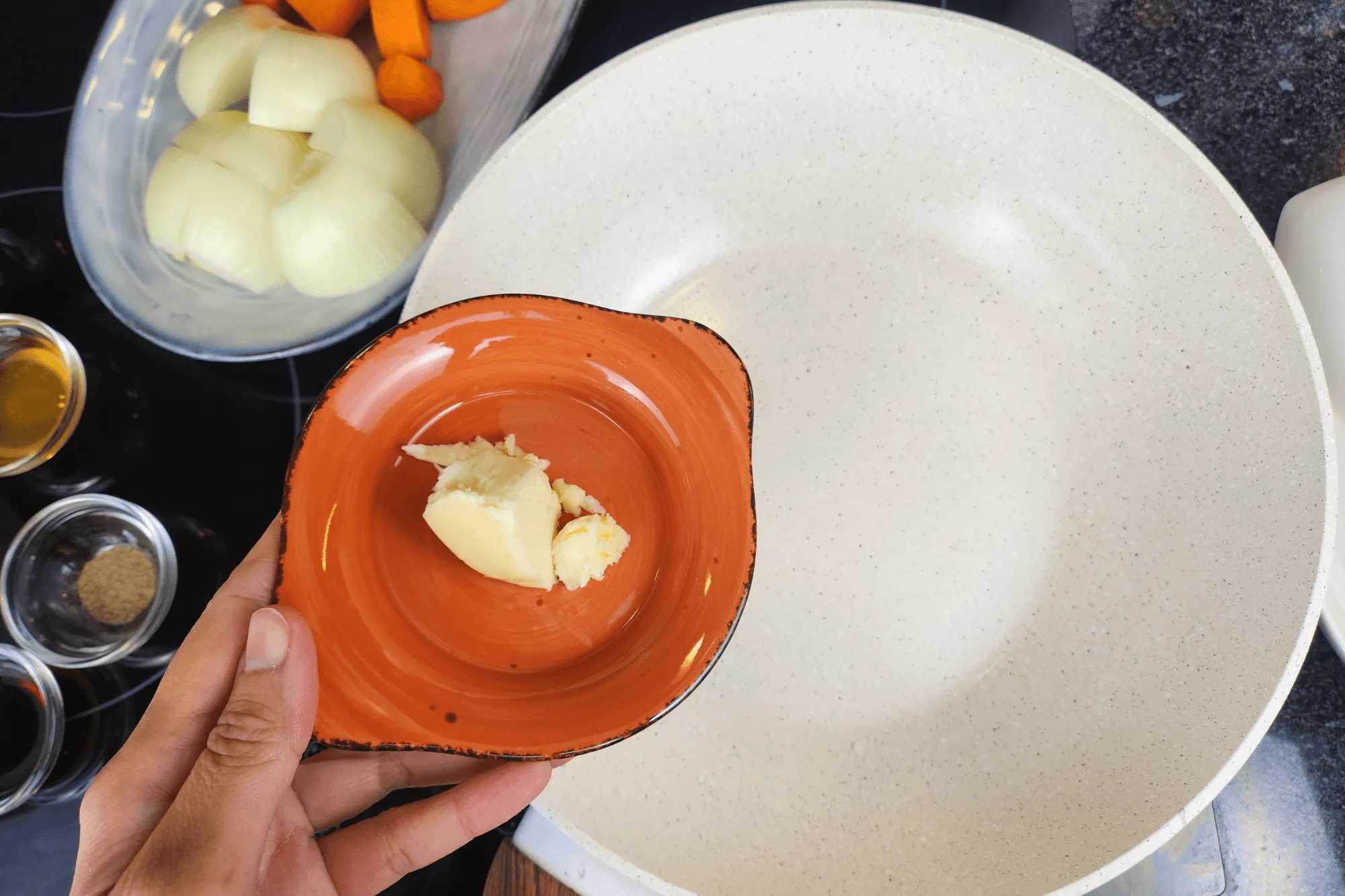 Heat a pot and add the butter to melt.