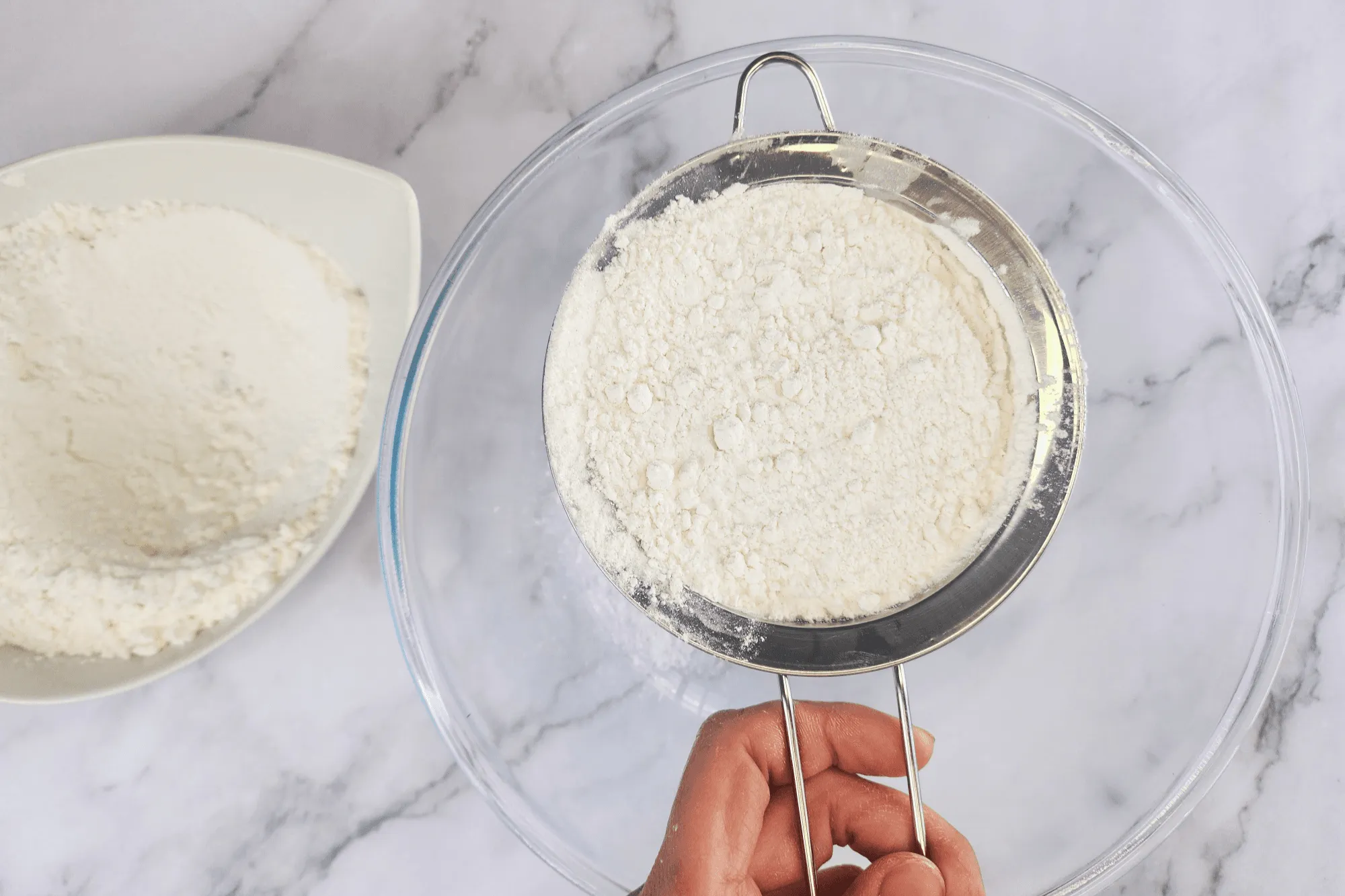 In a large bowl, sift the all-purpose flour to keep it light and smooth.