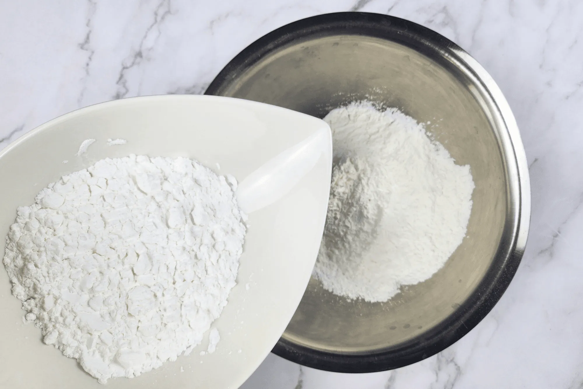 In a mixing bowl, add Tapioca Starch