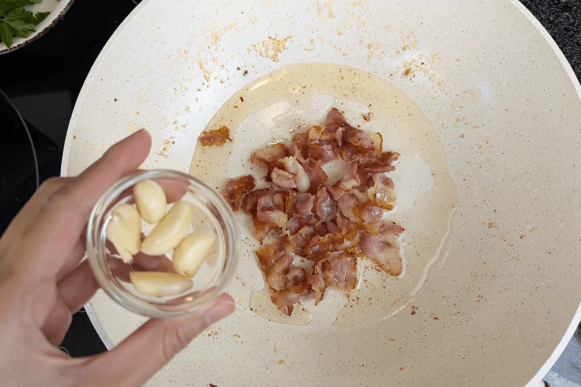 In the same pan, sauté garlic