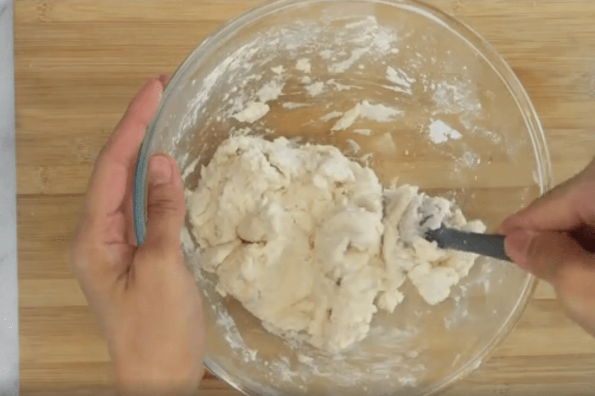 Keep mixing until the dough starts to come together.