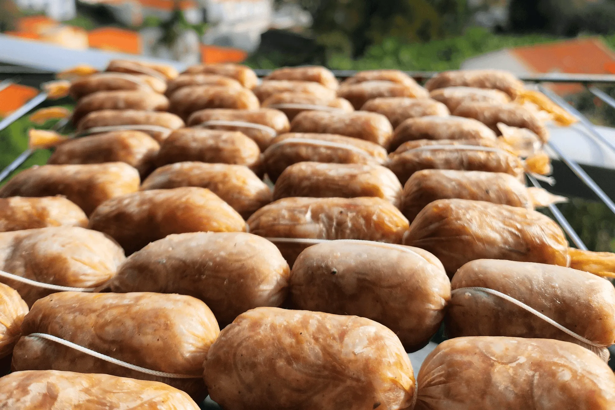 Let the sausages air dry for at least 1 day. For a tangier flavor, leave them for a couple days to ferment. 