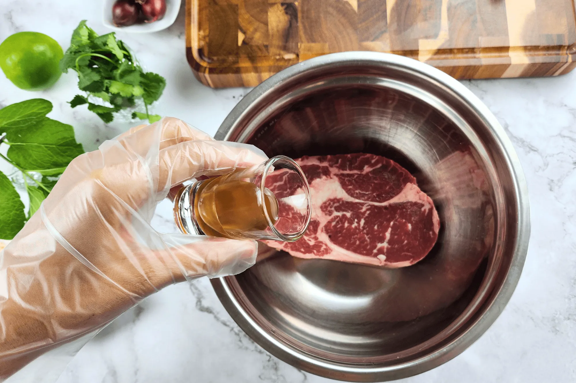 Mix the beef with oyster sauce, fish sauce, and palm sugar.