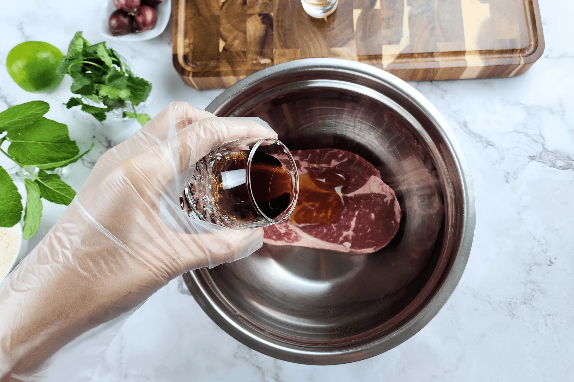 Mix the beef with oyster sauce, fish sauce, and palm sugar.