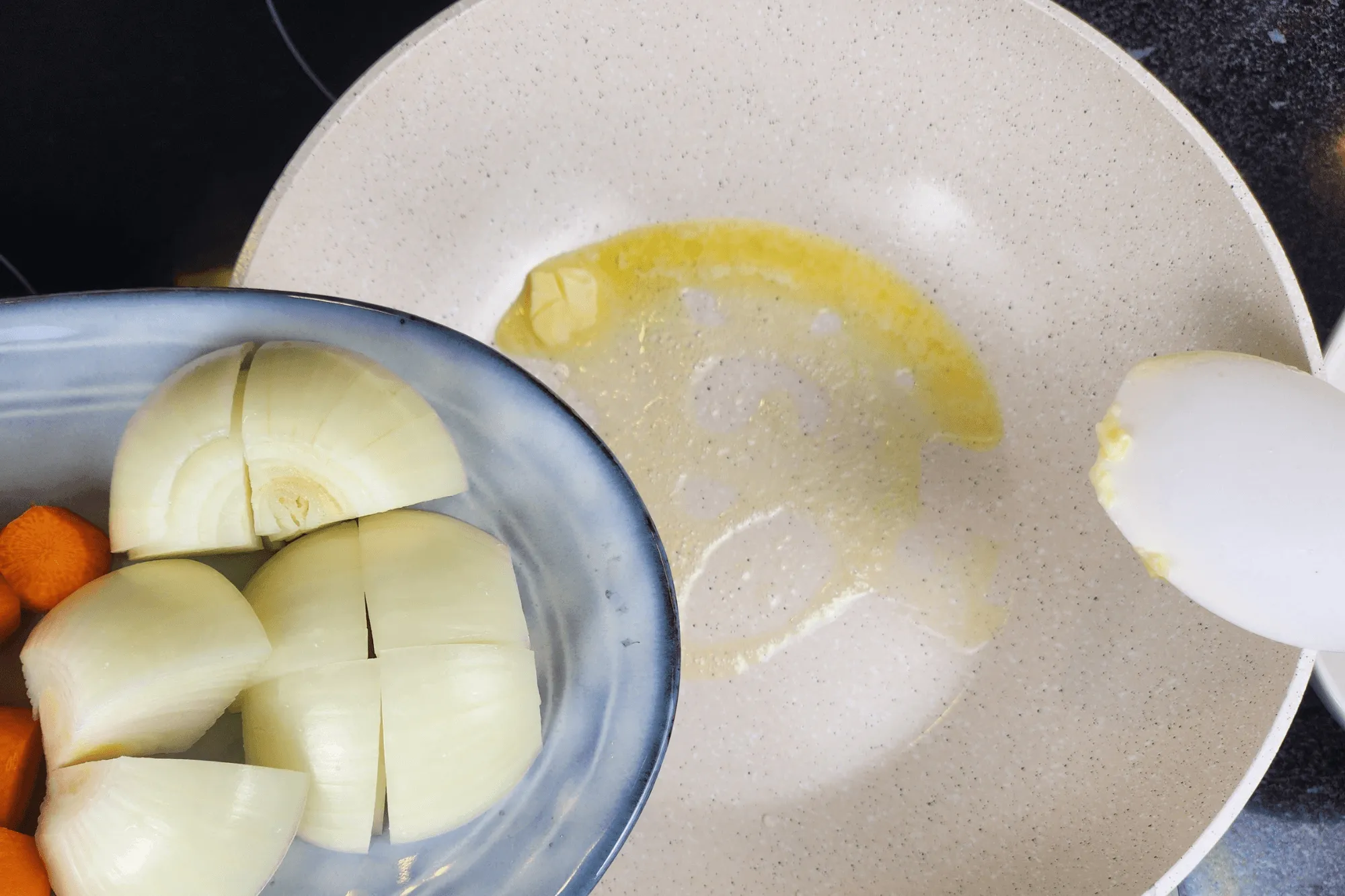 Once the butter melts, add the onion and sauté until fragrant