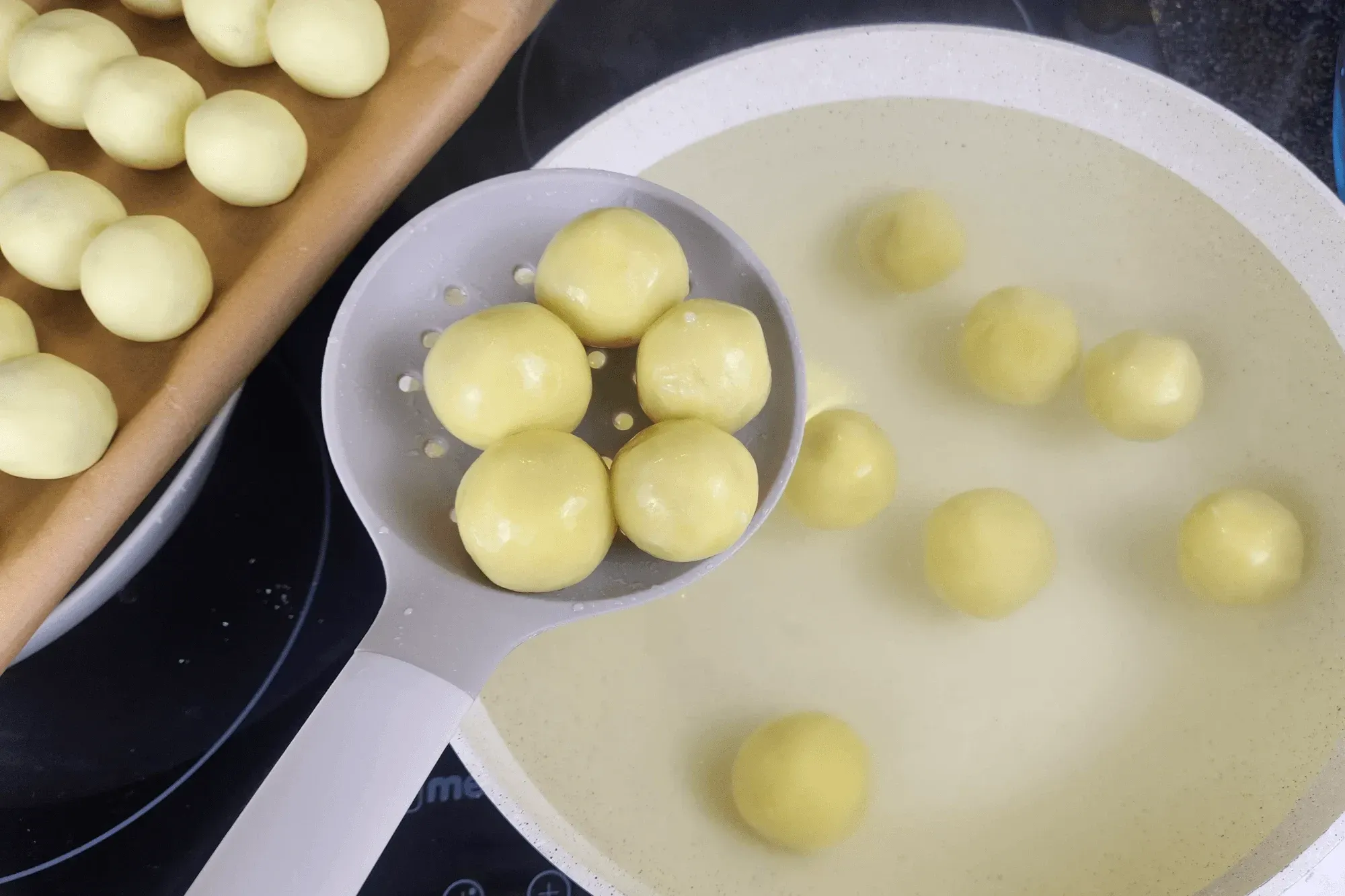 Once they float, remove them from the pot and drain the excess water.