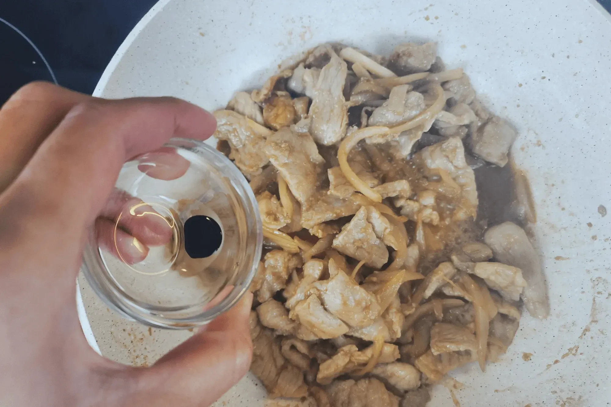 Optional: If you want a darker color, you can add a little dark soy sauce to the ginger pork for a deeper color.
