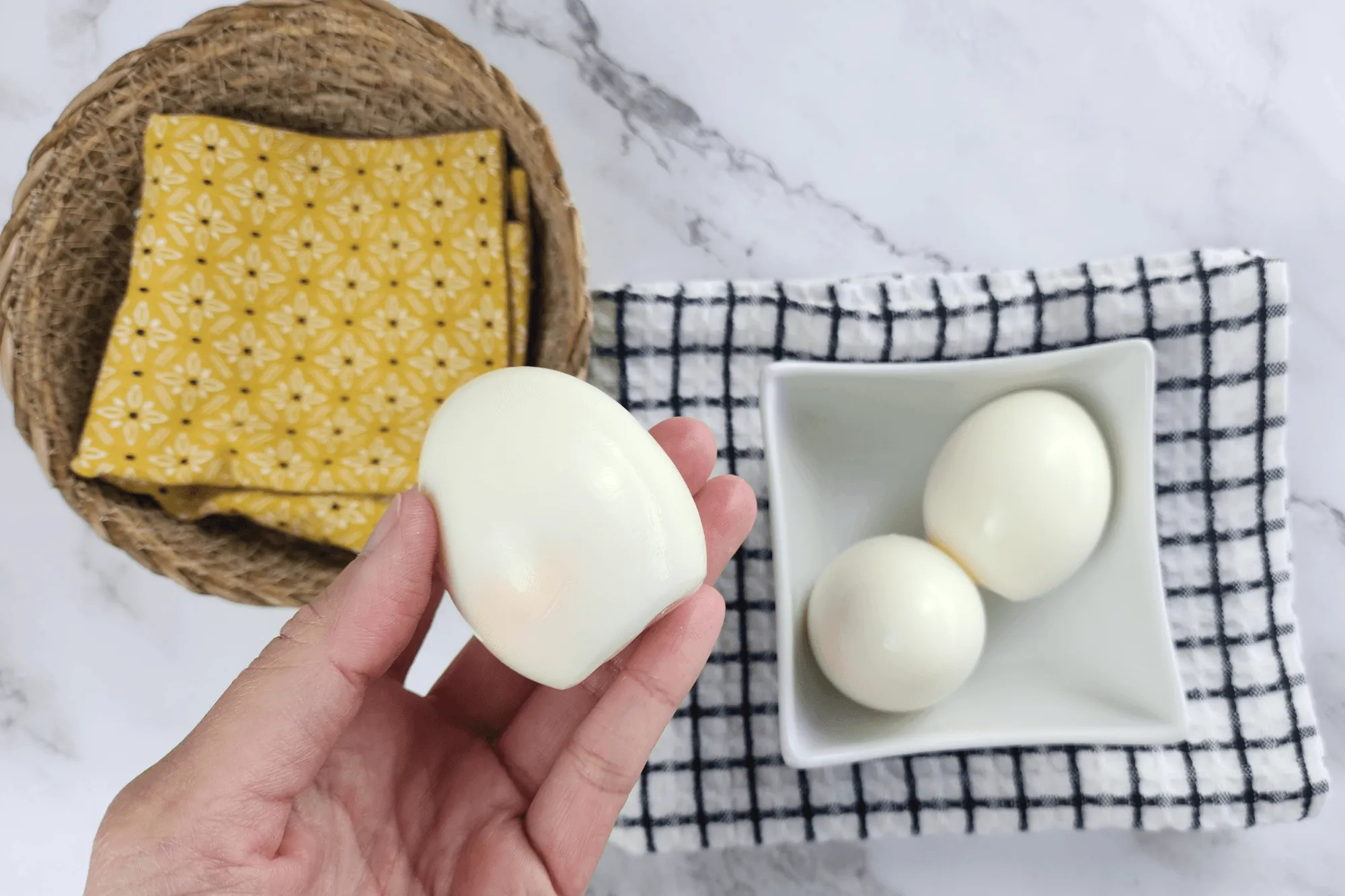 Peel the boiled eggs and set them aside for the next step.