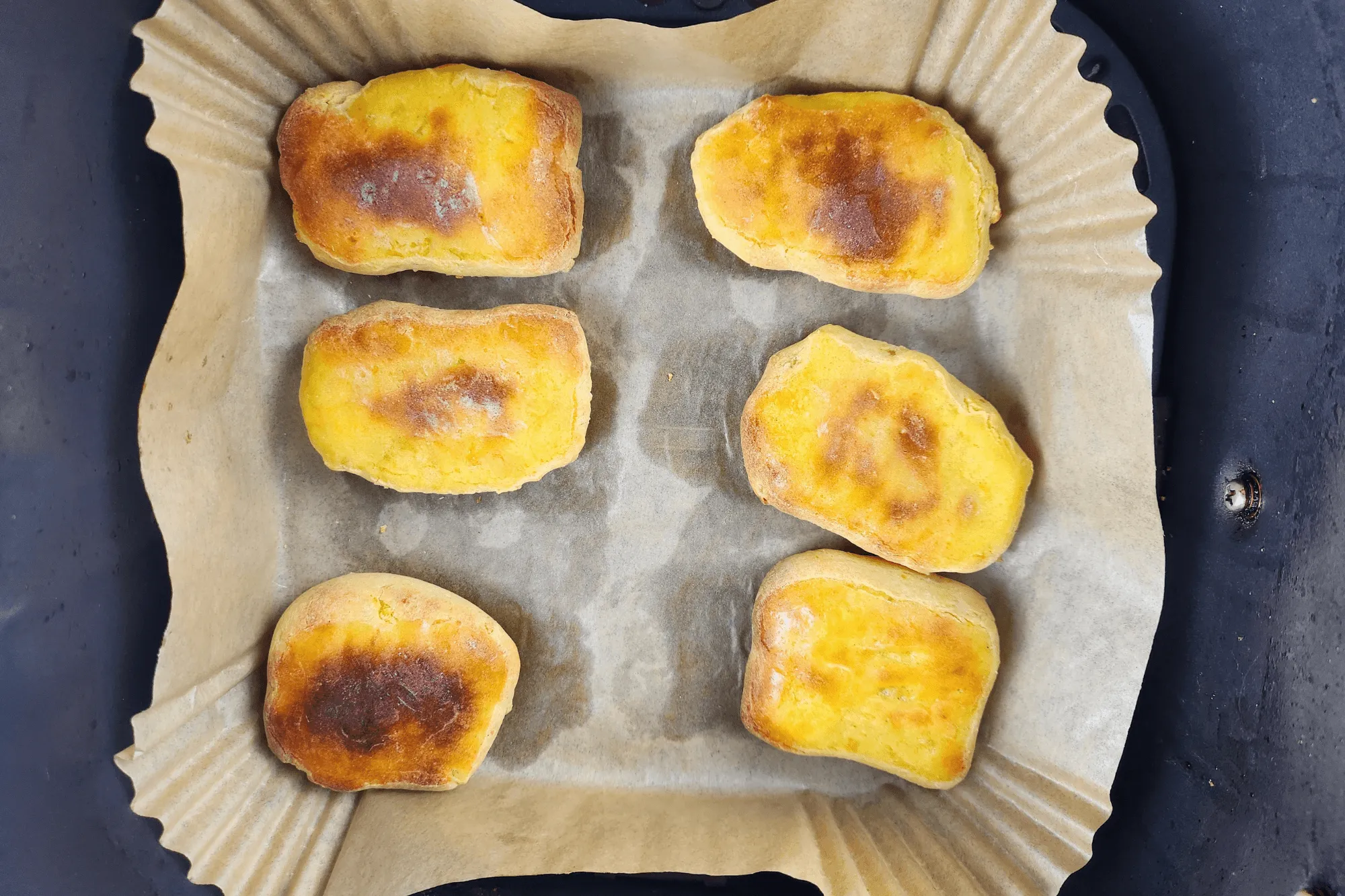 Place the shaped sweet potatoes in an air fryer