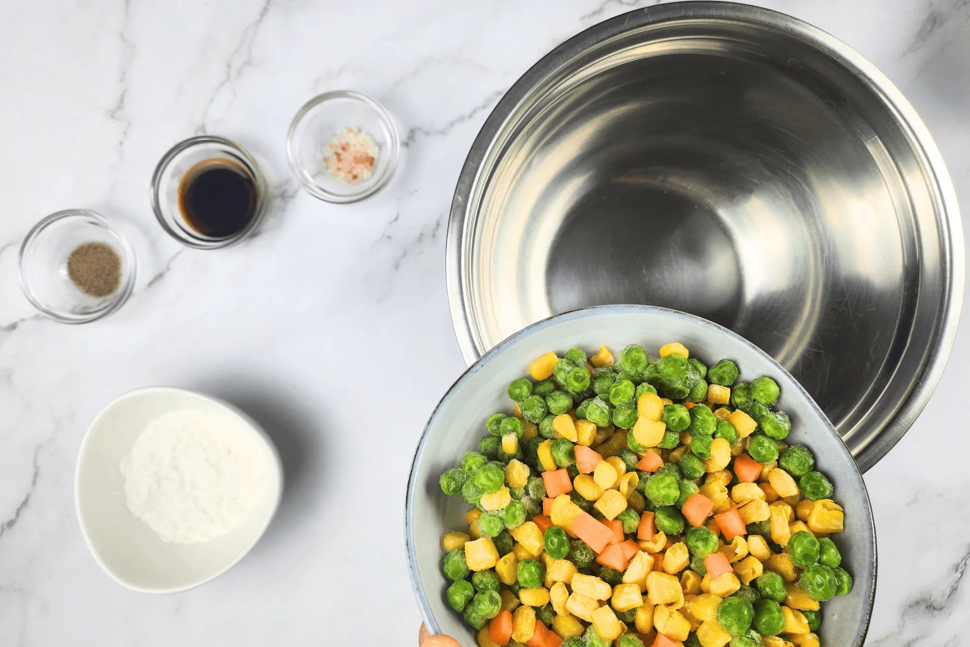 Place the mixed vegetables in a bowl.