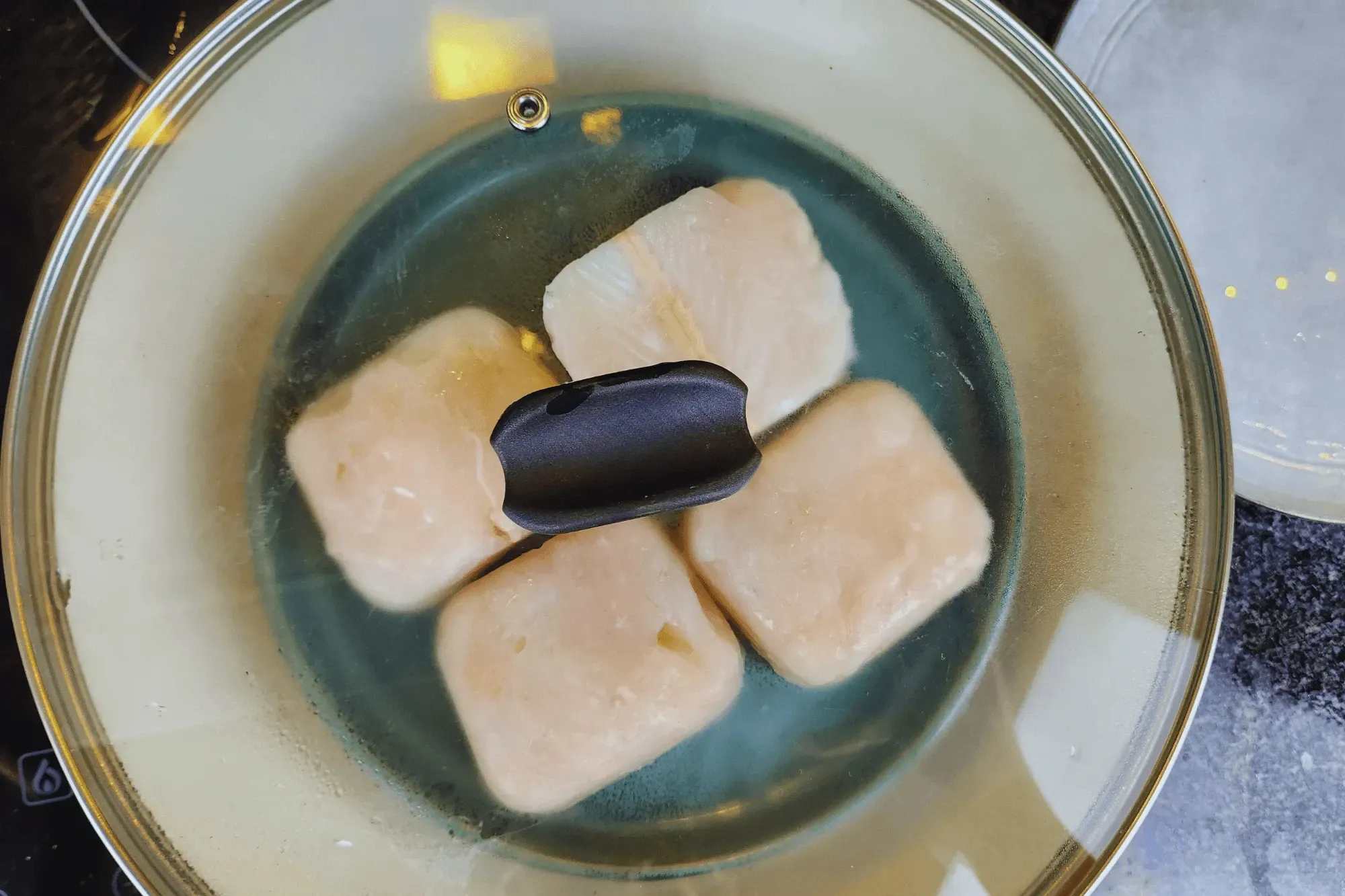 place the plate with the fish in the steamer and steam for 8-10 minutes until the fish is fully cooked.
