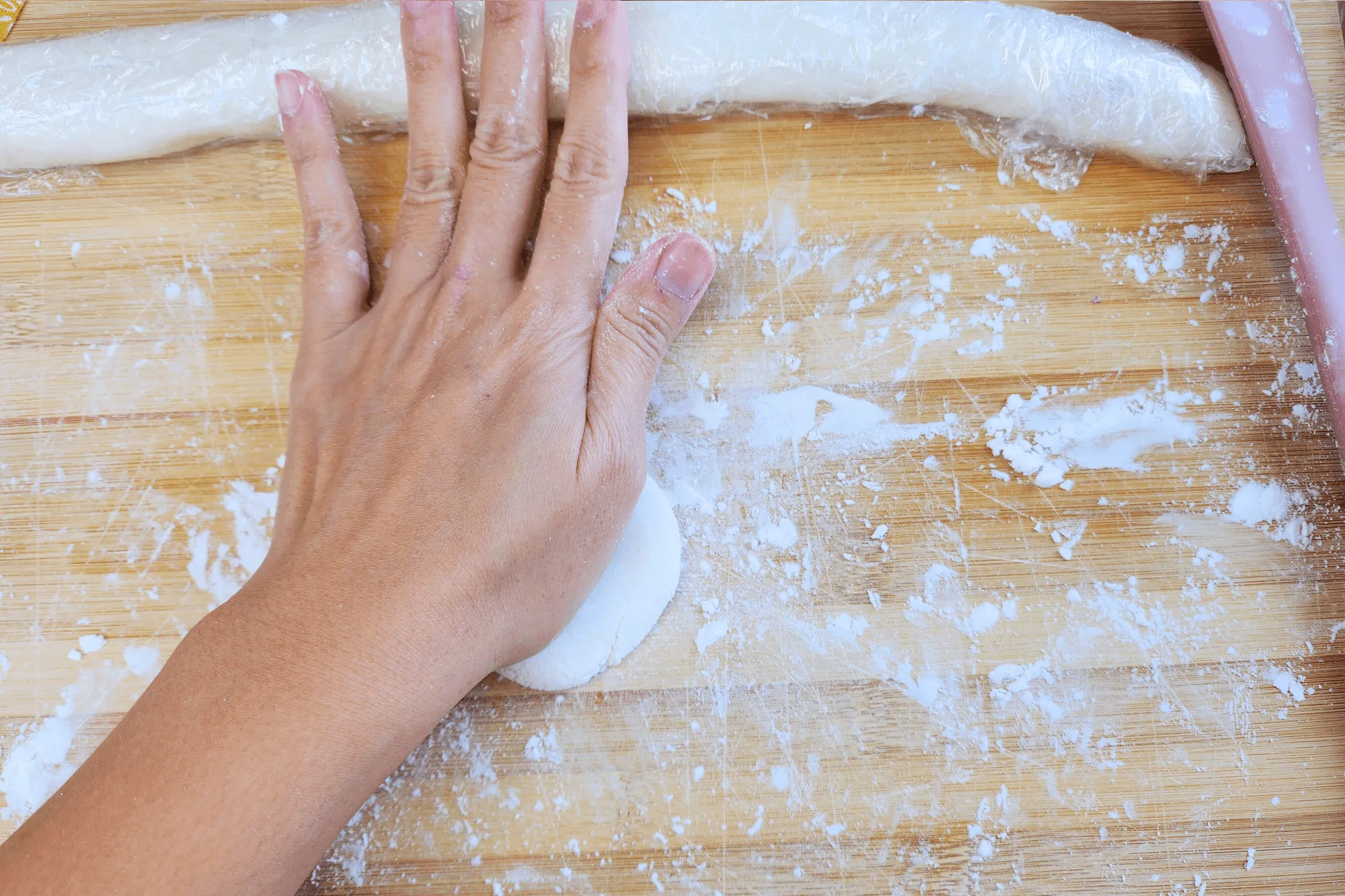 Press it gently onto your work surface to flatten it slightly.