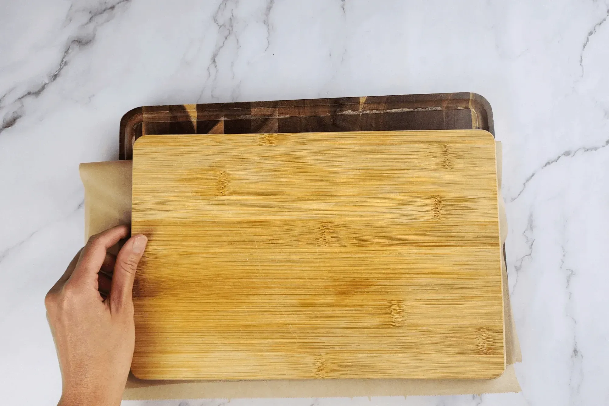Press the bananas flat. by chopping board