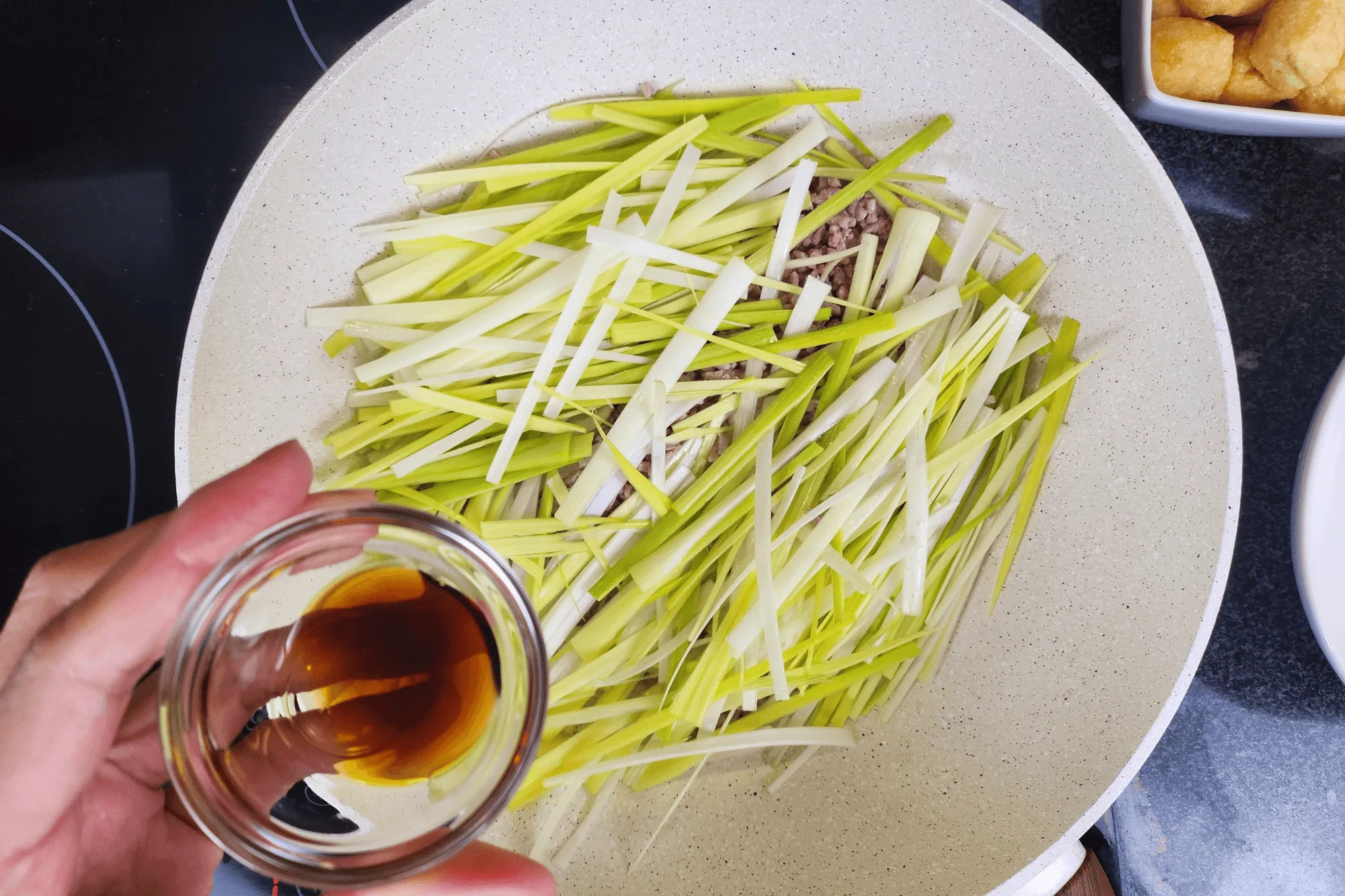 Season with  light soy sauce-Stir-Fried Leeks with Tofu