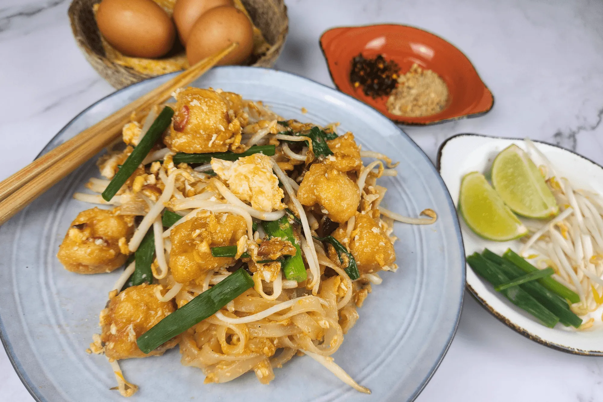 Serve the Pad Thai on a plate