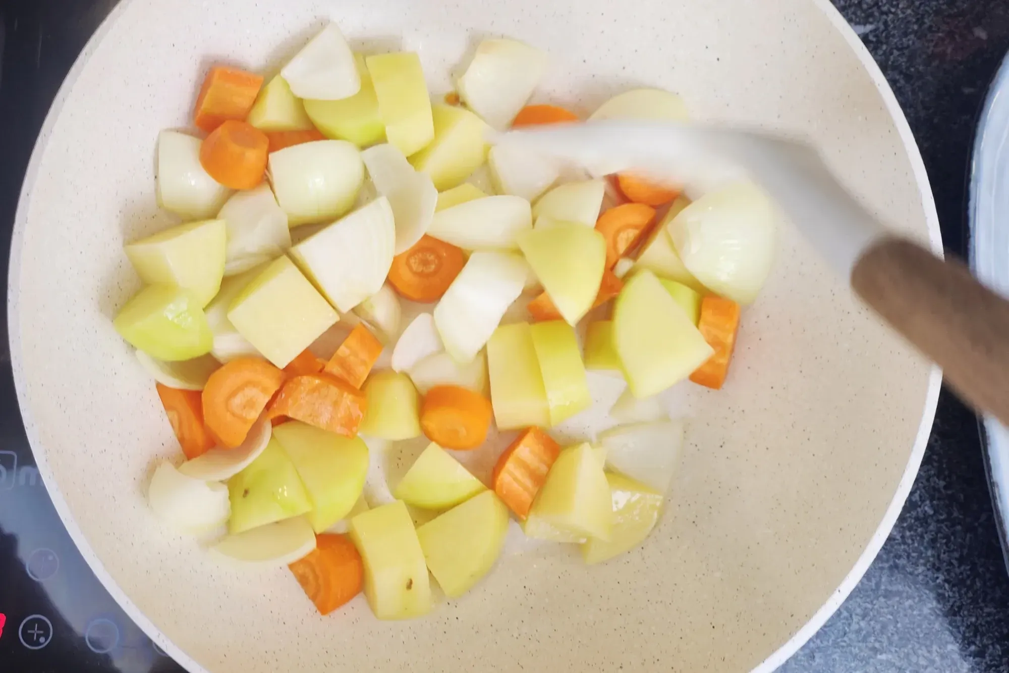 Stir-fry until the onions soften and become translucent 