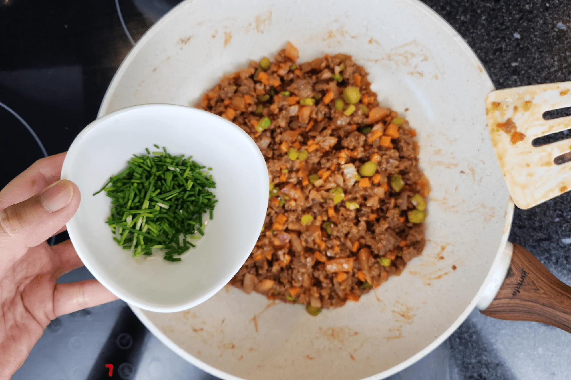 Stir in the scallion and coriander, mix thoroughly, then remove from heat and set aside.