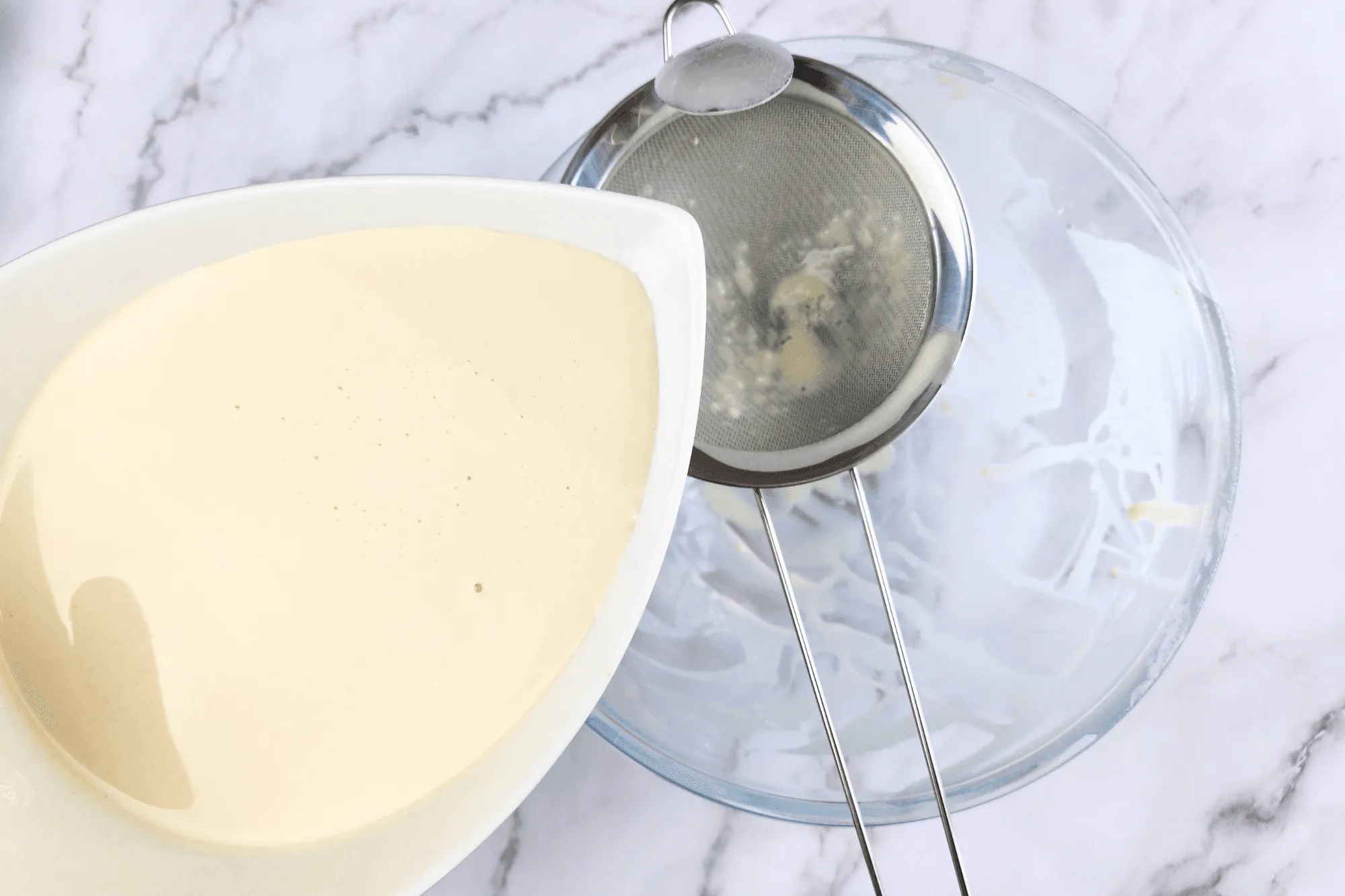 Strain the mixed batter twice for a smooth