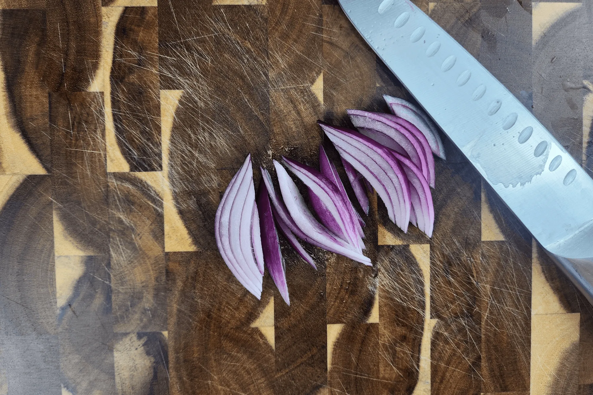 Thinly slice the red onion