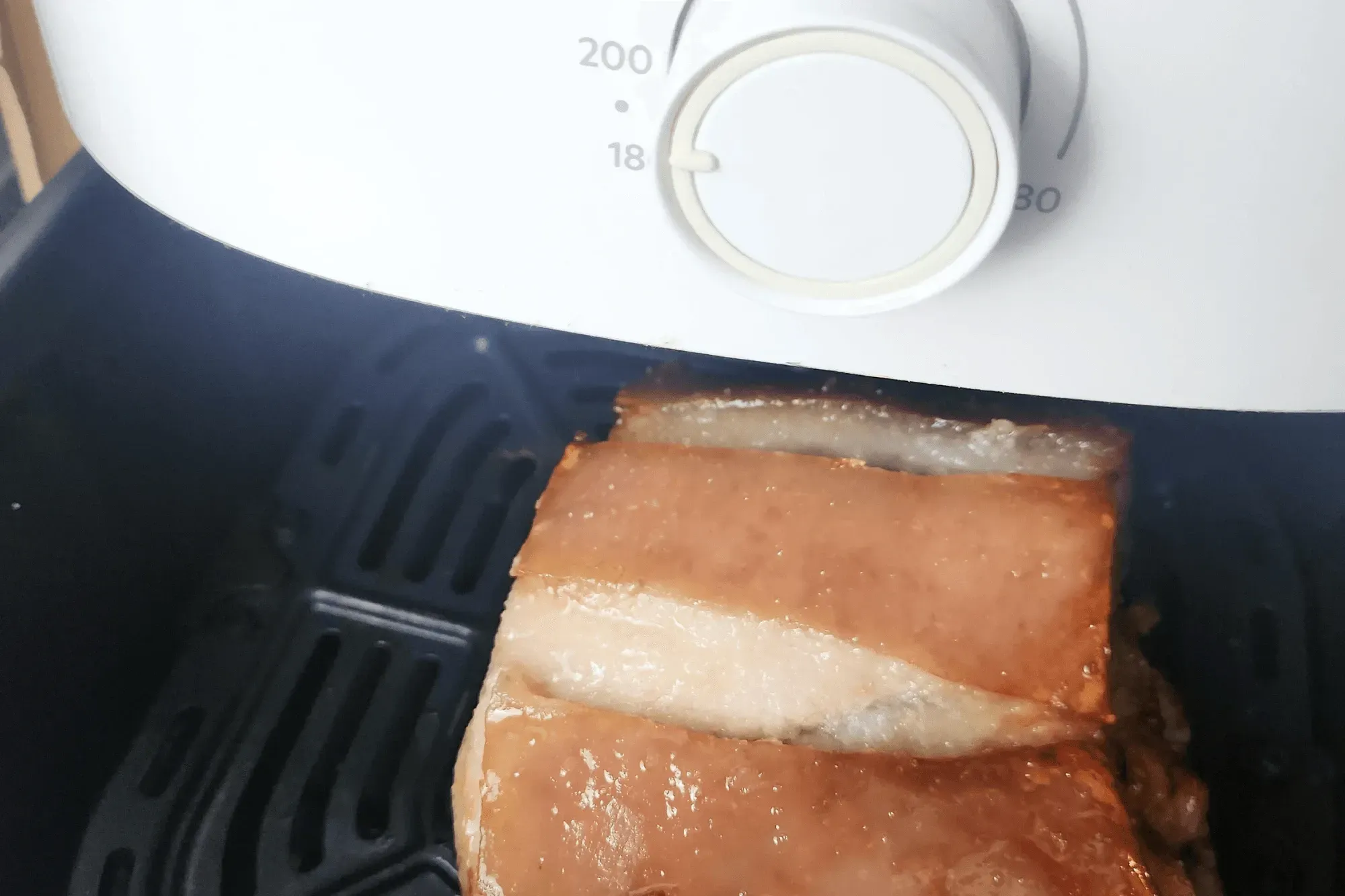 Third Round: Flip it back with the skin side up. Air fry at 200°C (392°F) for another 15 minutes.