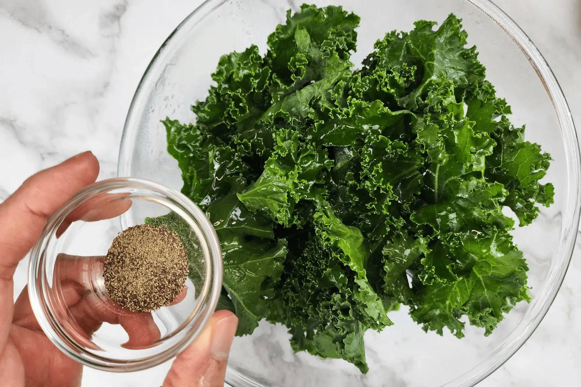 Toss the kale with olive oil, salt, black pepper