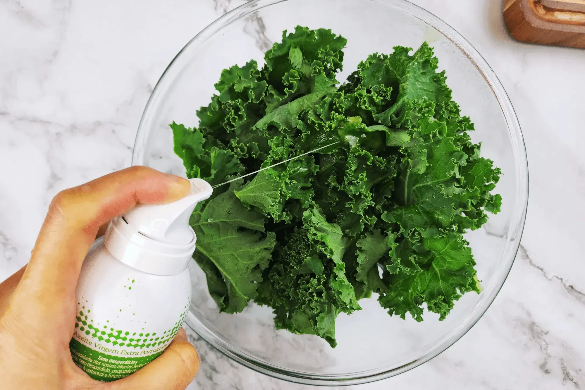 Toss the kale with olive oil