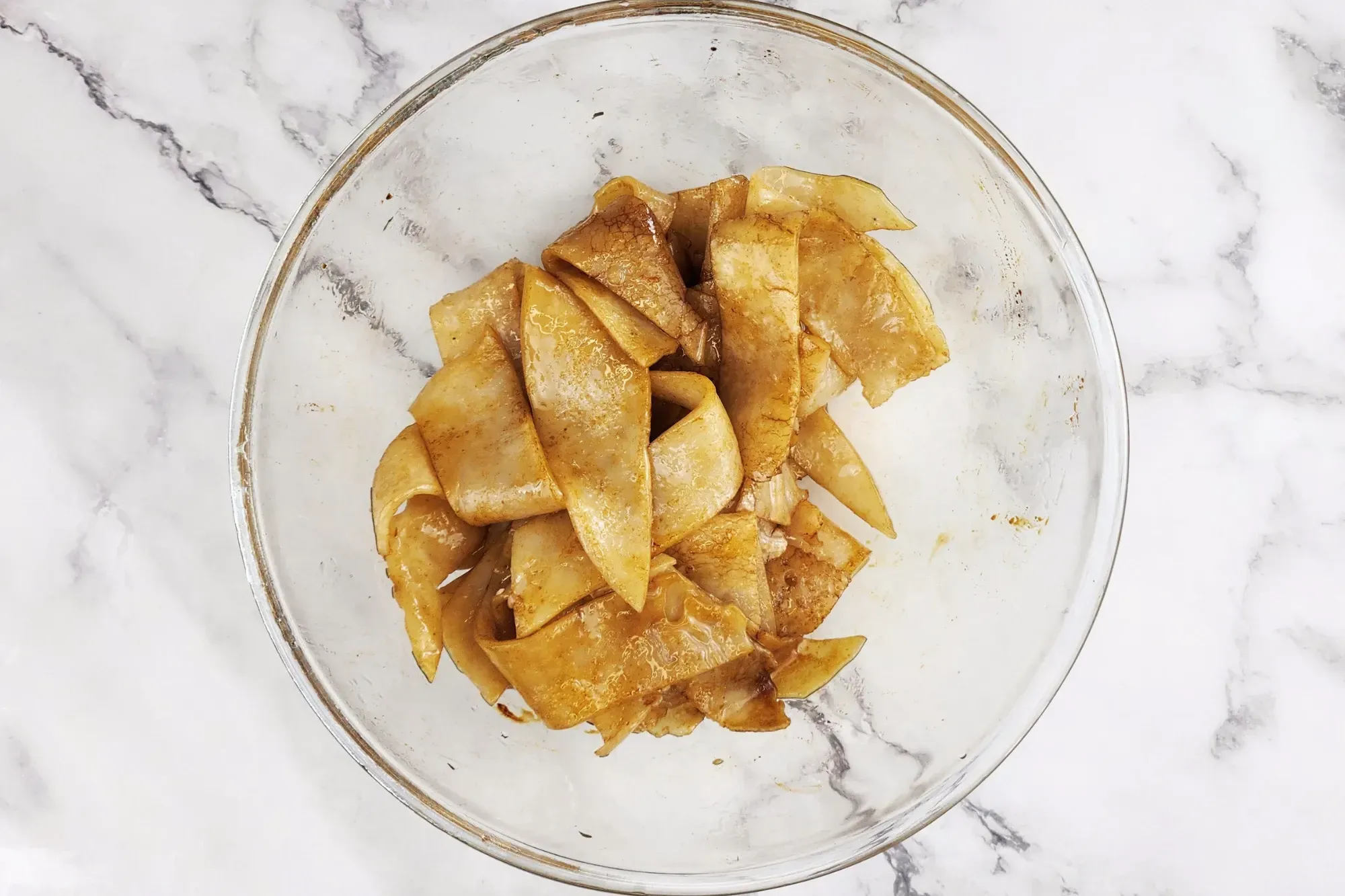 Toss them together until the noodles are evenly coated