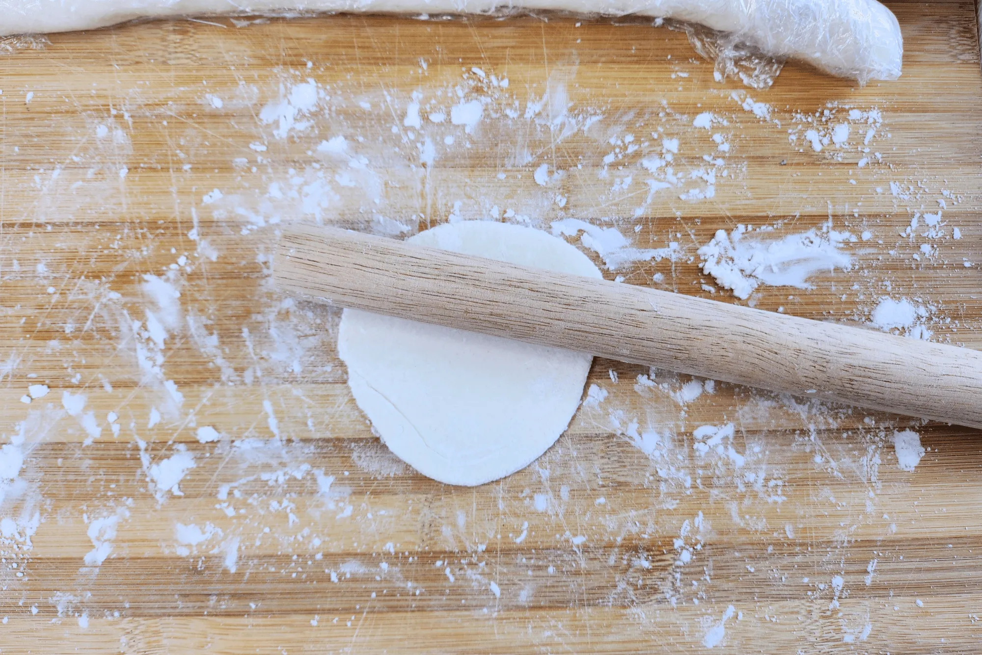 Use a rolling pin to roll out the dough