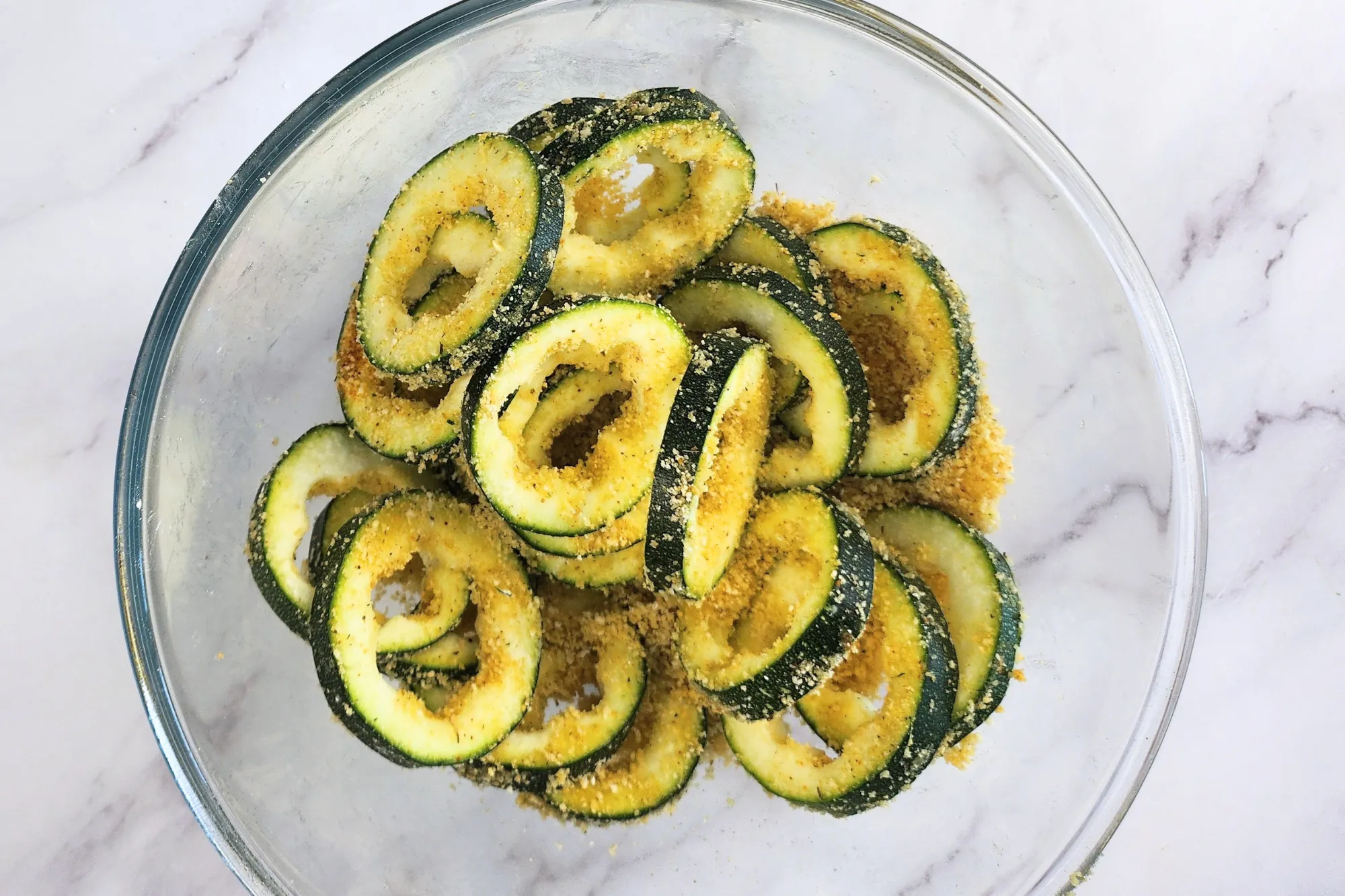 Zucchini rings in mixing bowl